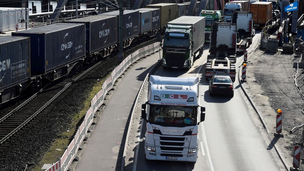 Containers are transported to loading terminals in the port in Hamburg