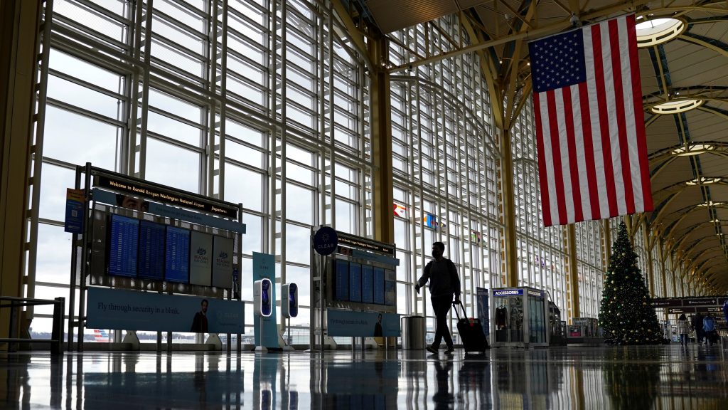 A passenger makes his way through Ronald Reagan Washington National Airport in Arlington, Virginia